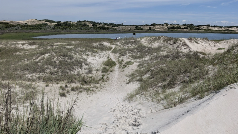A view of the Bear Island kayak launch/landing area from the top of the dune