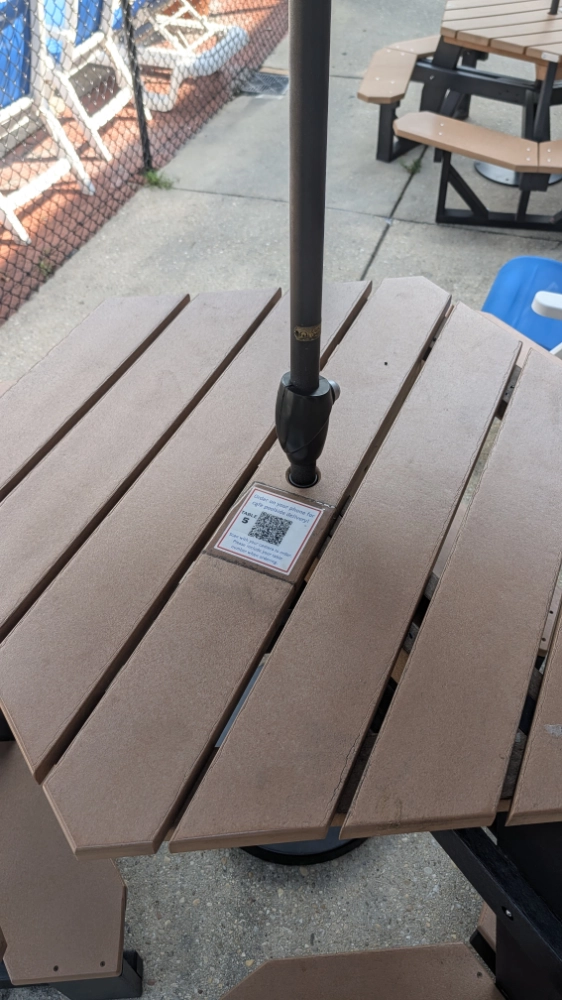 Use the QR code to have food delivered right to your poolside table at Cherry Hill Park in College Park, Maryland