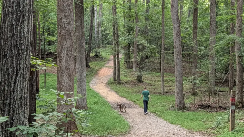 Aiken and Jesse on an unpaved trail in Pocahontas State Park in Chesterfield, VA